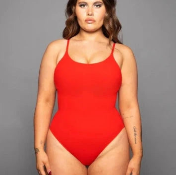 A stylish, backless one-piece swimsuit in a variety of vibrant colors for women's summer fashion.