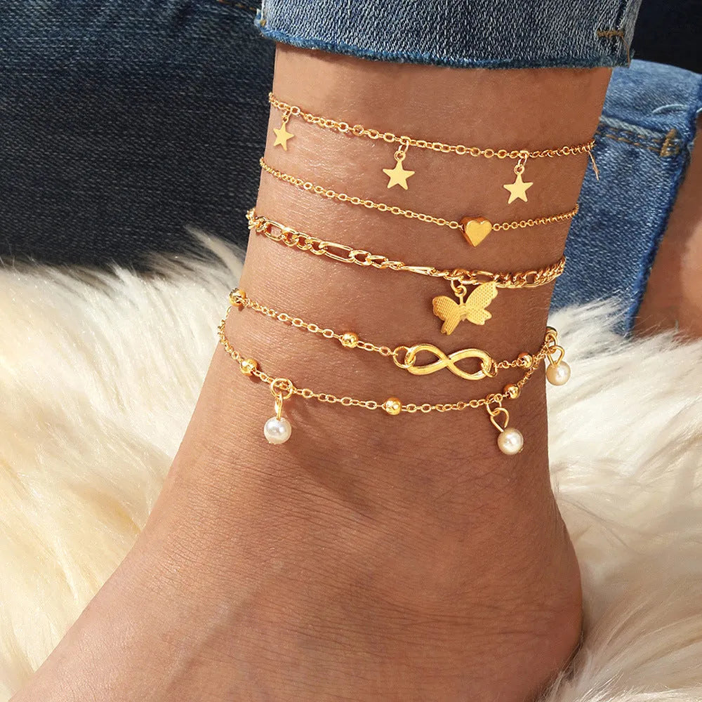 Butterfly love design four-piece alloy anklet set for women with pearl heart details