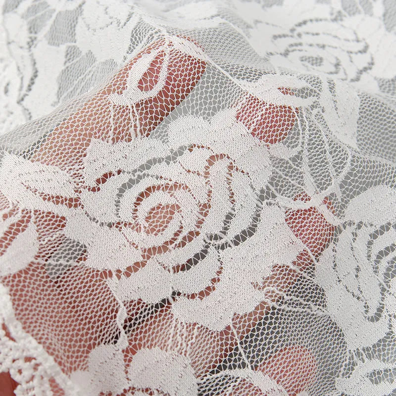 Round white floral polyester head cover accessory for brides measuring 30cm