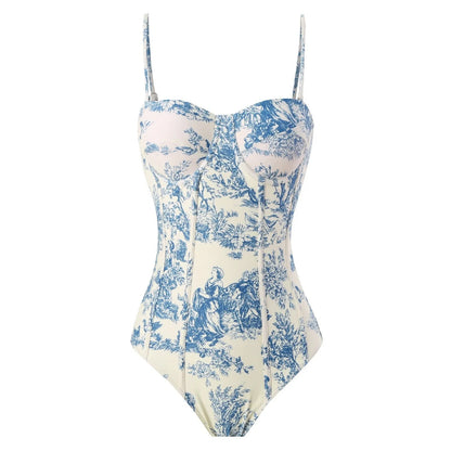 Blue women's one-piece swimsuit on a hanger with a separate gauze skirt.