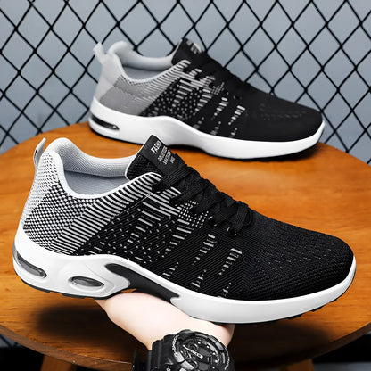 Men's black Flyknit mesh sneakers with round toe and lace-up front in casual low-top design