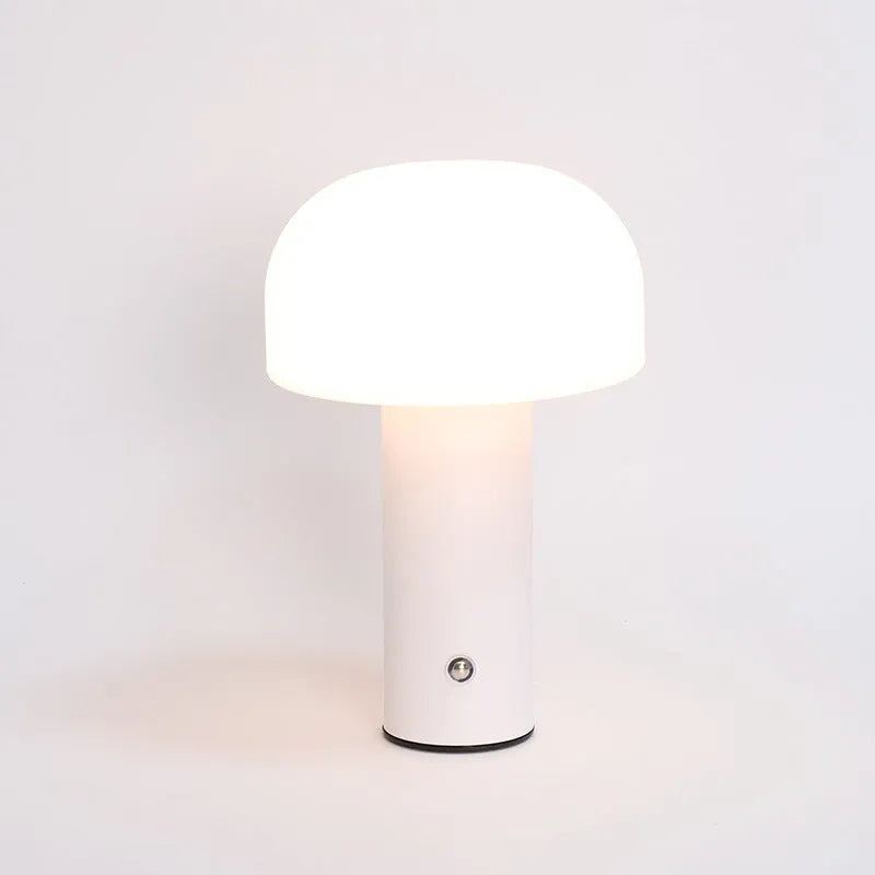 Creative USB table lamp in black with adjustable neck and integrated charging port on base.