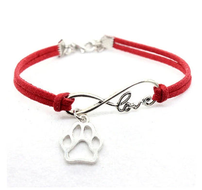 Stylish hand-woven infinite love pet bracelet in various colours, featuring a bow design and made of premium alloy materials