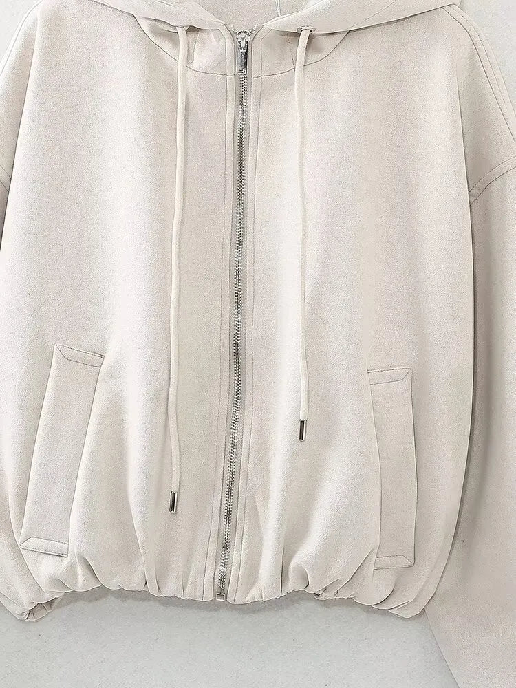 Women's casual hooded suede jacket in black colour on a hanger.