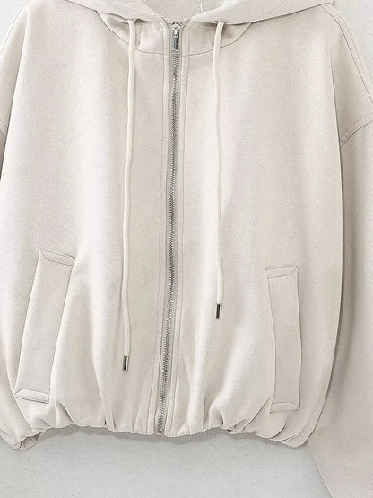 Women's casual hooded suede jacket in black colour on a hanger.