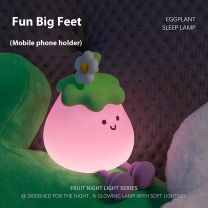 Cartoon eggplant-shaped night light with soft yellow glow measuring 100mm diameter