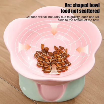 Blue ceramic raised pet bowl with floral pattern and non-slip base for cats or small dogs