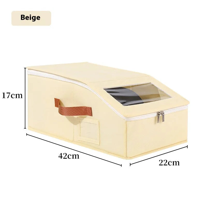 Grey foldable fabric storage box with lid for organising shoes and caps.