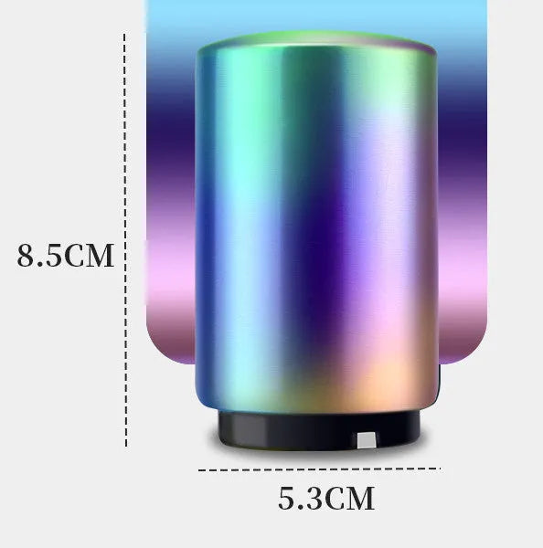 Stainless steel automatic bottle opener measuring 8.4 cm by 5.3 cm on a kitchen counter