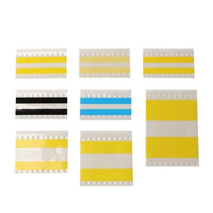 Box of SMT double-sided splicing tape on a factory bench, showing yellow tape in 8mm, 12mm, 16mm and 24mm widths.