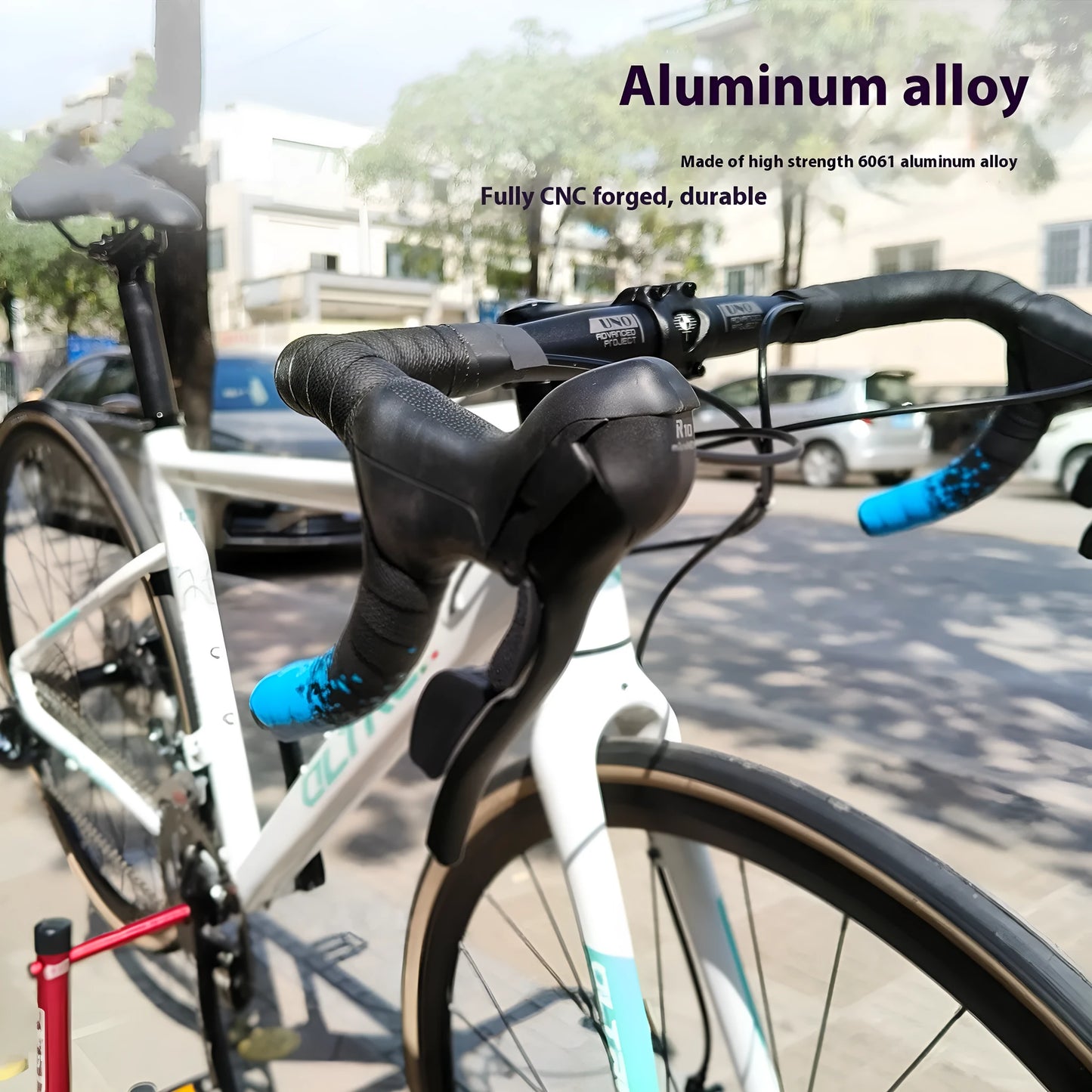 Black aluminium alloy road bike drop handlebar with printed UNO logo showing bend profile