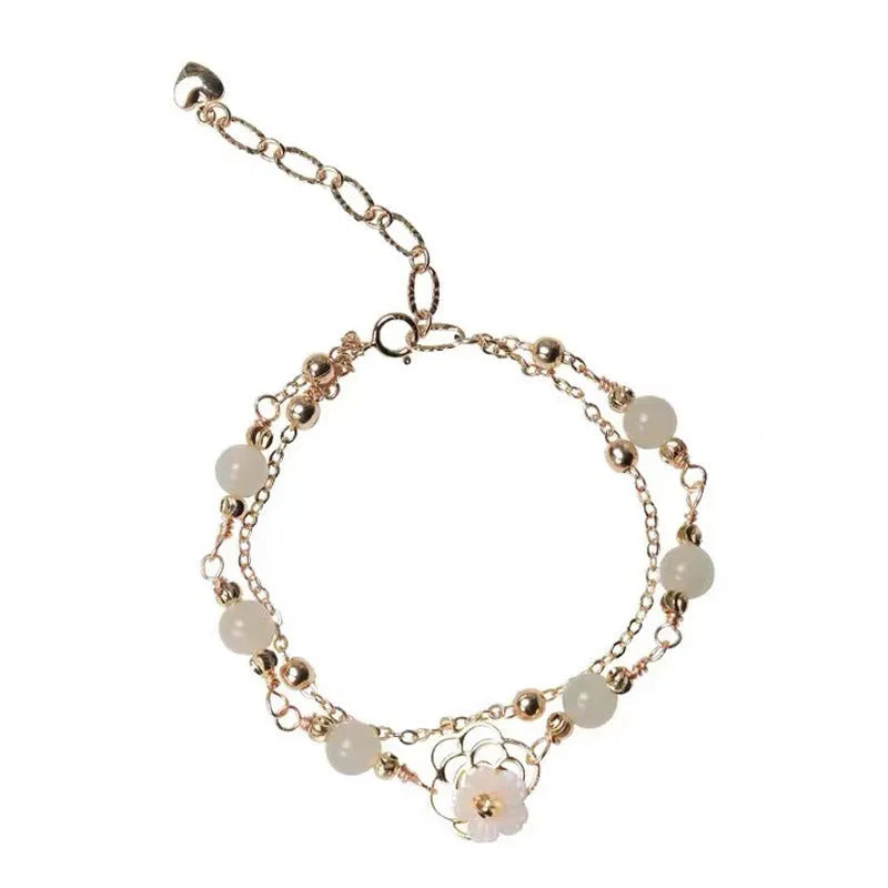 Yellow gold electroplated copper butterfly bracelet with geometric shapes for women