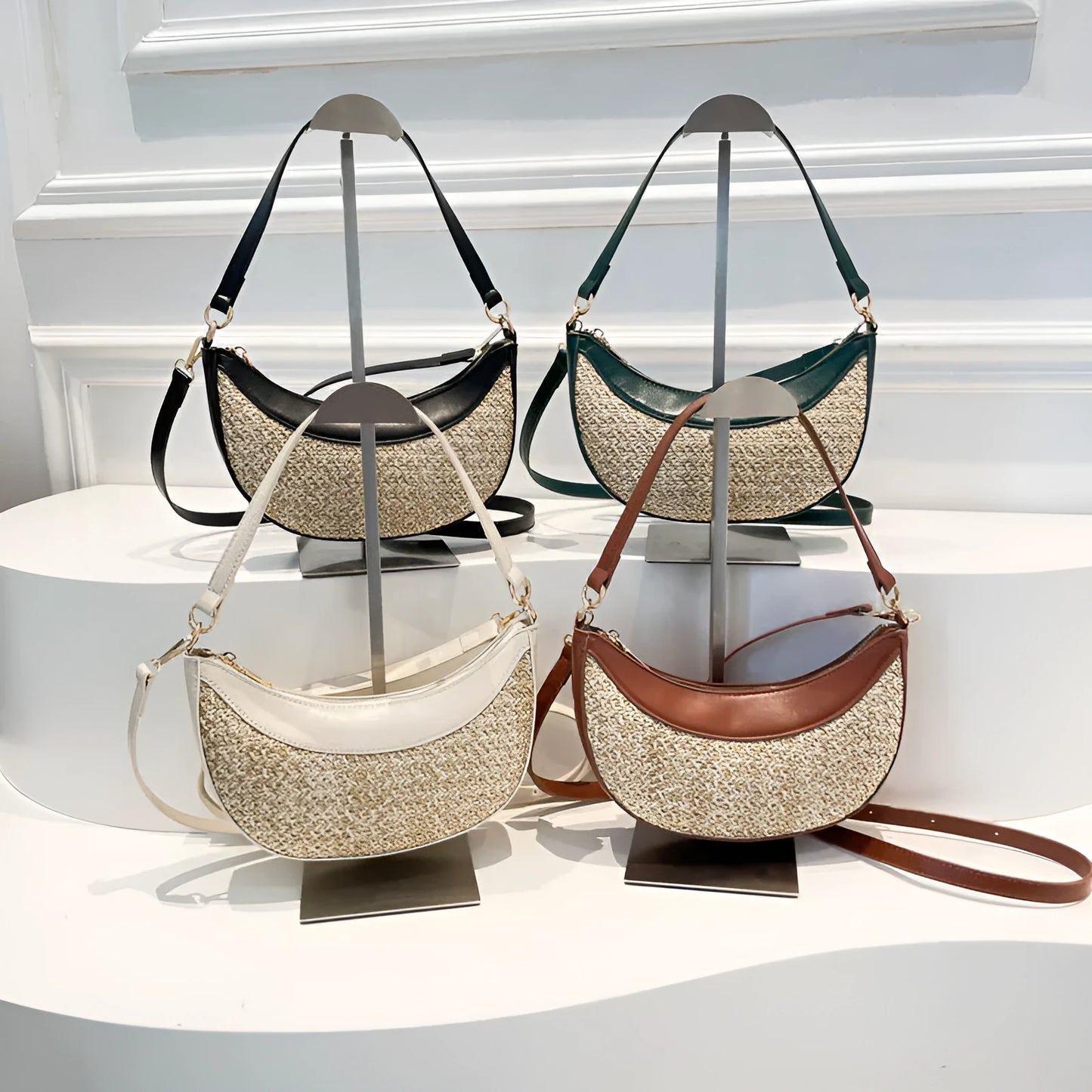 Women's straw crossbody dumpling bag in dumpling shape with contrast stitching details