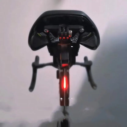 Waterproof USB rechargeable bicycle tail light in blue, pink, red, white, or yellow colours