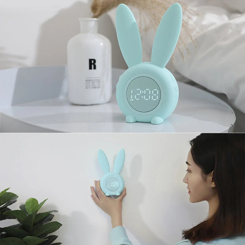 Adorable bunny-eared digital alarm clock with LED display, sound control, and magnetic design