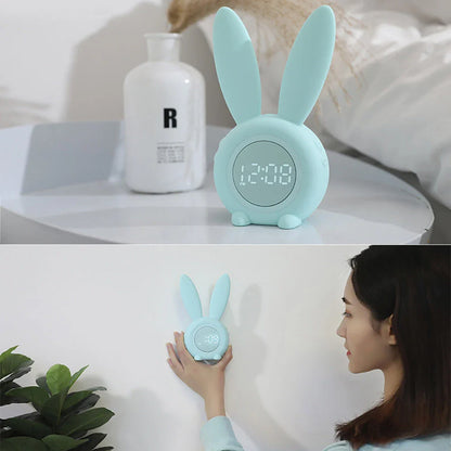 Adorable bunny-eared digital alarm clock with LED display, sound control, and magnetic design