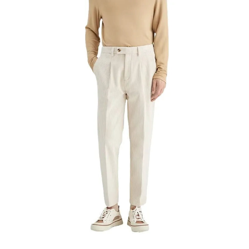 Men's straight-leg corduroy trousers in beige colour showing elastic waistband and loose fit