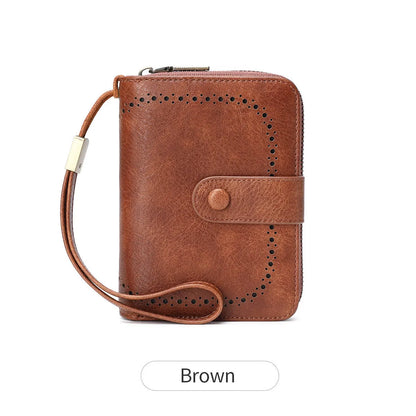 Small leopard print wallet with zipper closure showing stitching details