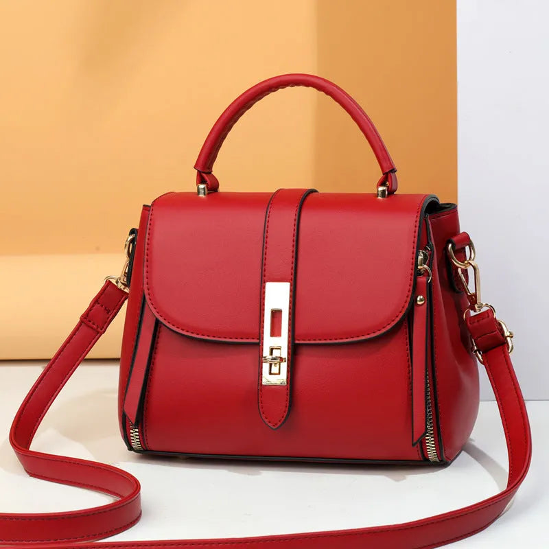 Soft black PU leather women's messenger bag with adjustable strap, shown in square vertical shape.