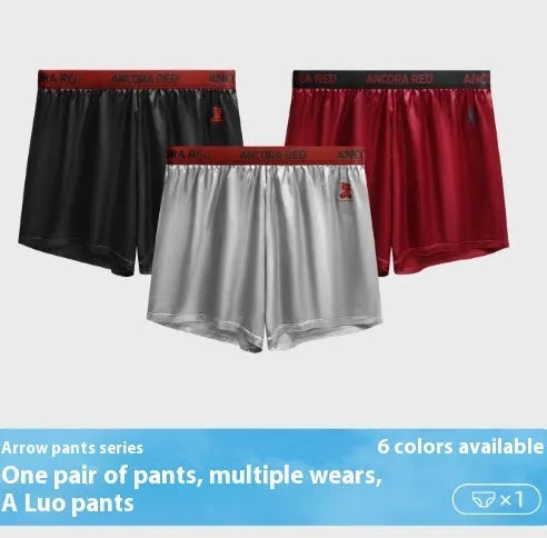 Men's solid colour boxer briefs in black, shown flat, highlighting the mid-waist design and knitted fabric texture.