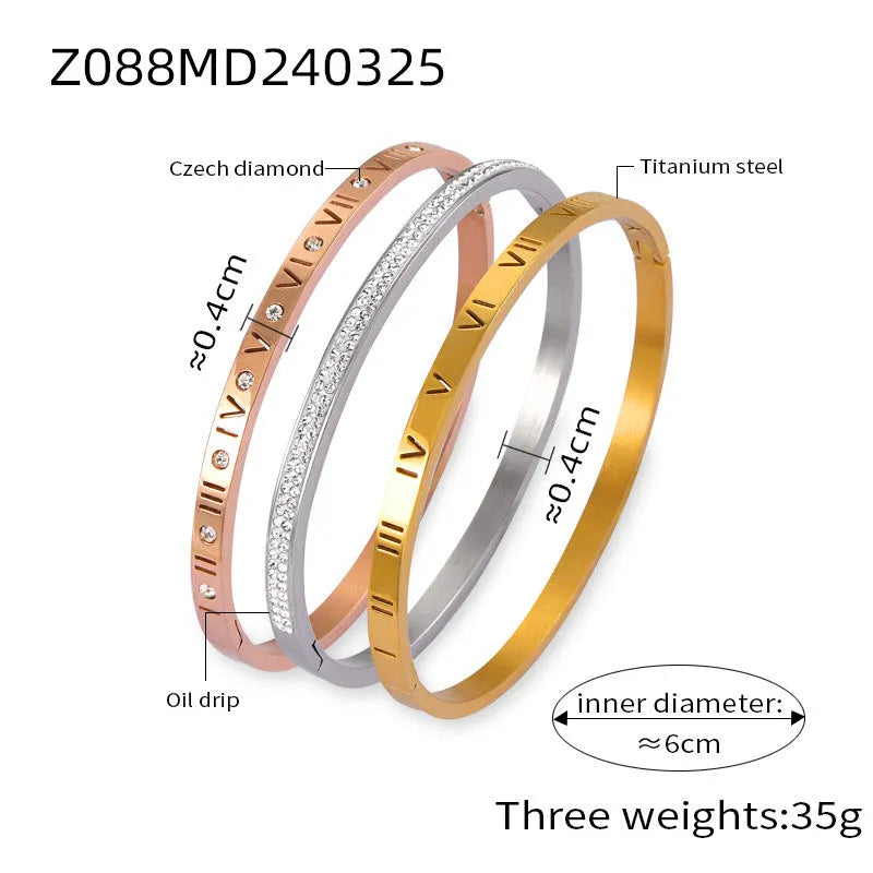 Titanium steel Roman numeral bracelet with gold plated carved design and diamond-embedded detail