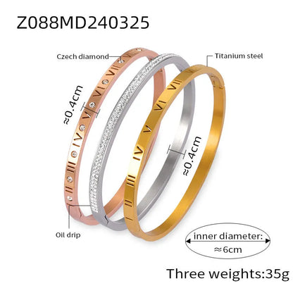 Titanium steel Roman numeral bracelet with gold plated carved design and diamond-embedded detail