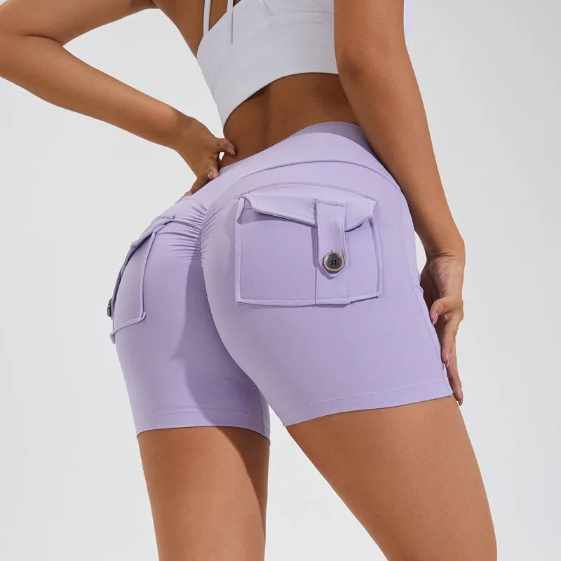 Women's high-waist quick-dry fitness shorts with side pockets in avocado green colour