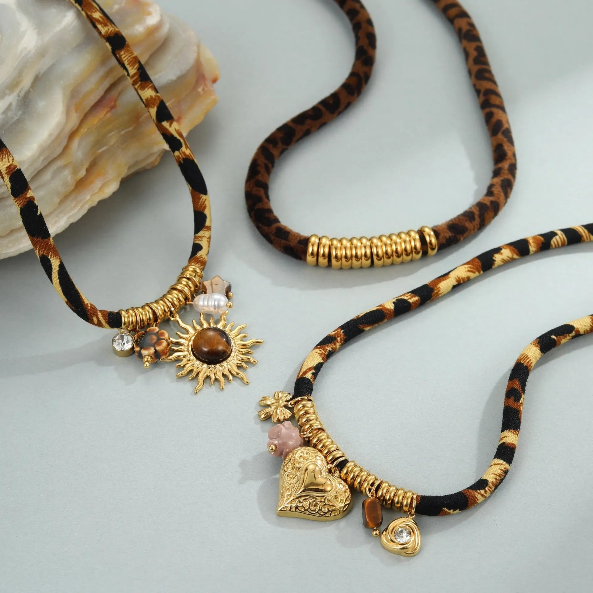 Stainless steel necklace with geometric leopard pendant on adjustable chain, 18K electroplated finish