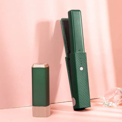 Pink and green cordless mini USB hair straightener and curler with ceramic plates.