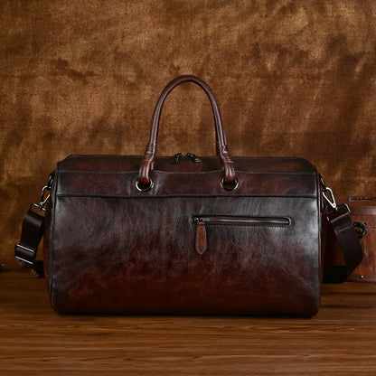 Handmade brown retro leather tote bag with large capacity for travel.