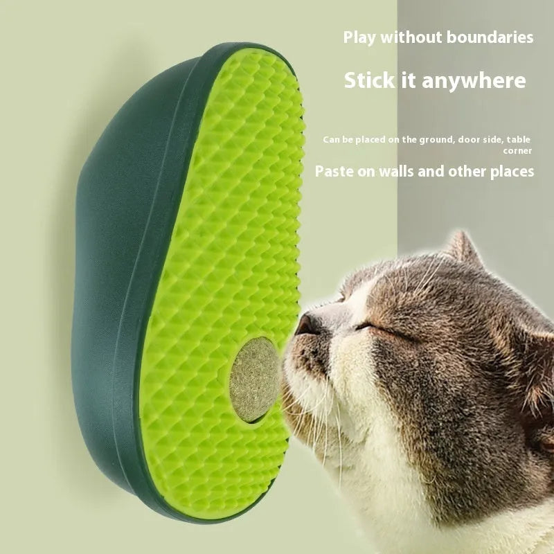 Avocado petting post cat scratching toy with self-service itch relief made from ABS plastic and soft TPR material measuring 13.5cm tall by 8.5cm wide by 6cm deep in green avocado colour for indoor play