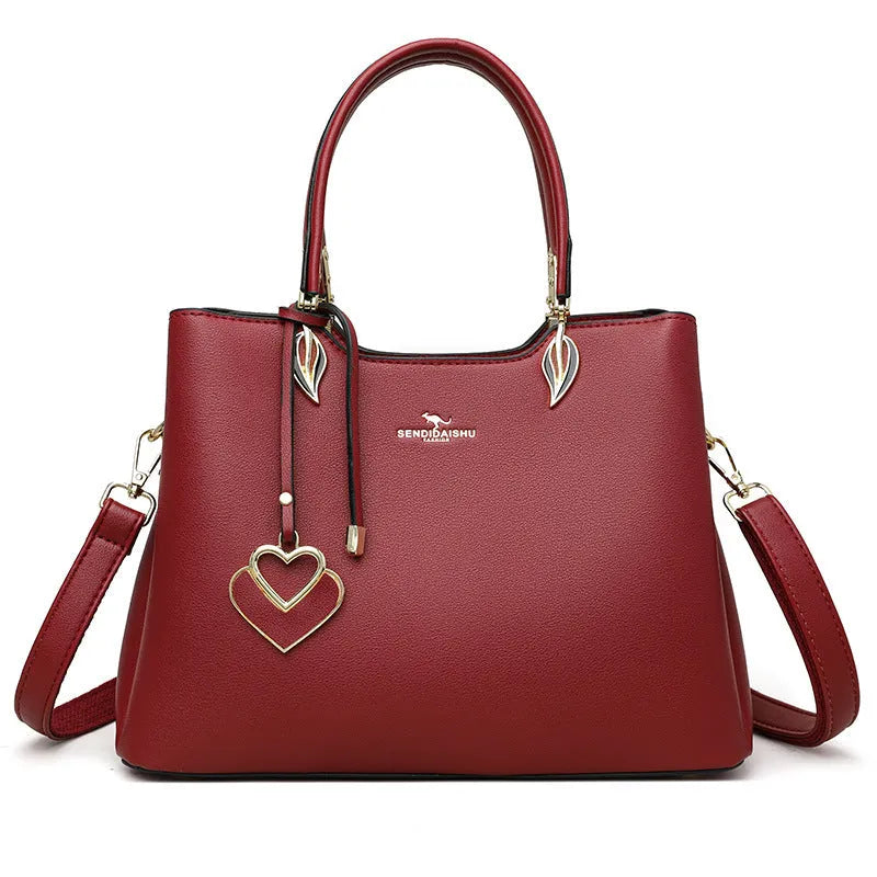 Black women's multi-layer PU leather shoulder messenger bag with sewing thread detail.