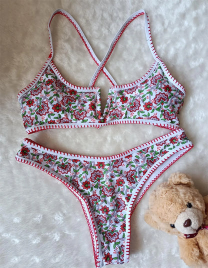 Women's floral embroidered V-neck bikini swimsuit on a mannequin