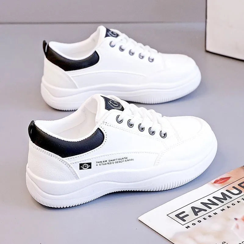 Women's white Korean-style lace-up pumps with cross straps and a 3-5 cm mid-heel on a rubber sole.