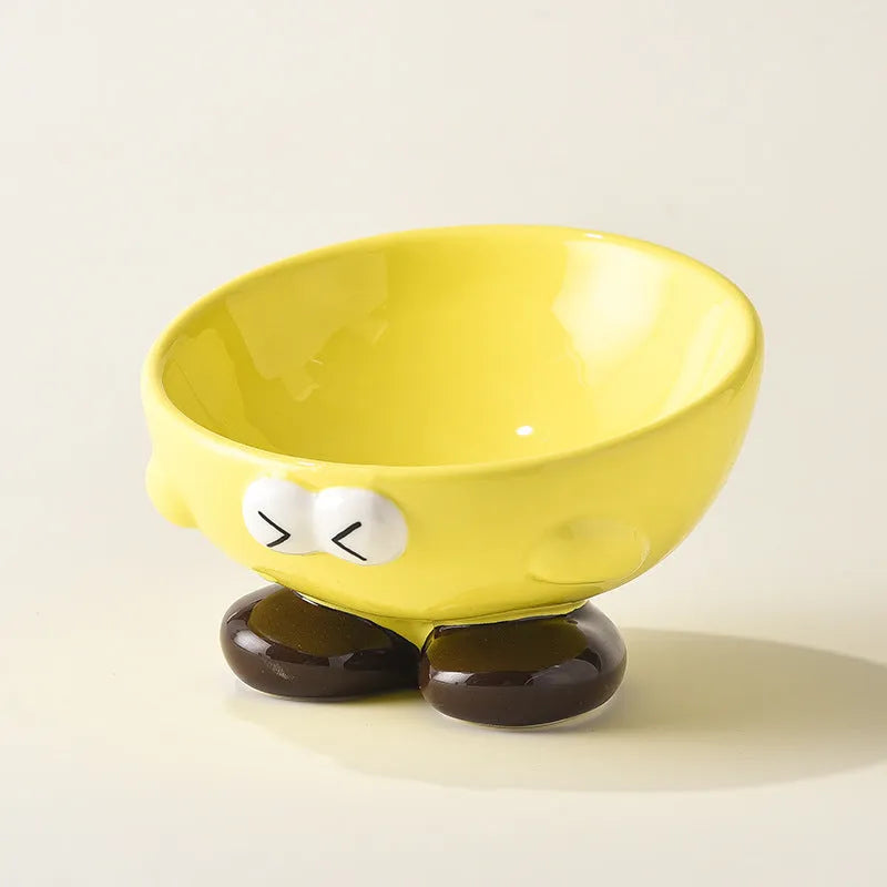 Ceramic slanted pet bowl with decorative expression pattern in blue colour
