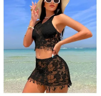 Women's white bikini set with tassel skirt cover-up and lace trim