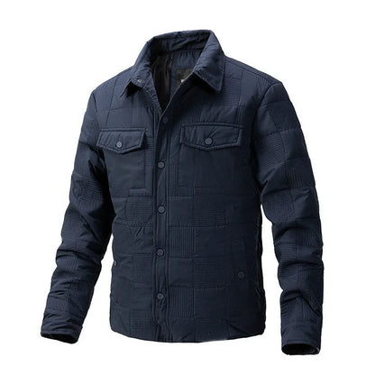 Man wearing a quilted polo collar shirt jacket in army green, showing the wool lining and knitwear style.