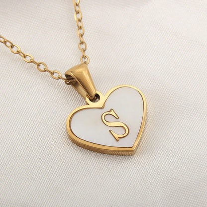 Personalized heart-shaped white shell necklace with adjustable clavicle chain, a stylish and versatile jewelry piece for women