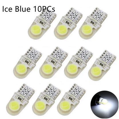 Pack of ten T10 wedge base LED car bulbs with COB chips in various colours on a white background