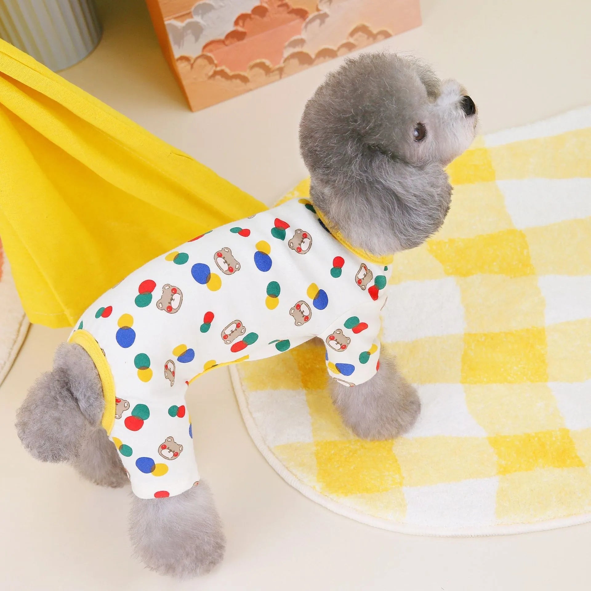 Beige dog clothing with colourful ball bear design, made from cotton and spandex blend, size L shown.