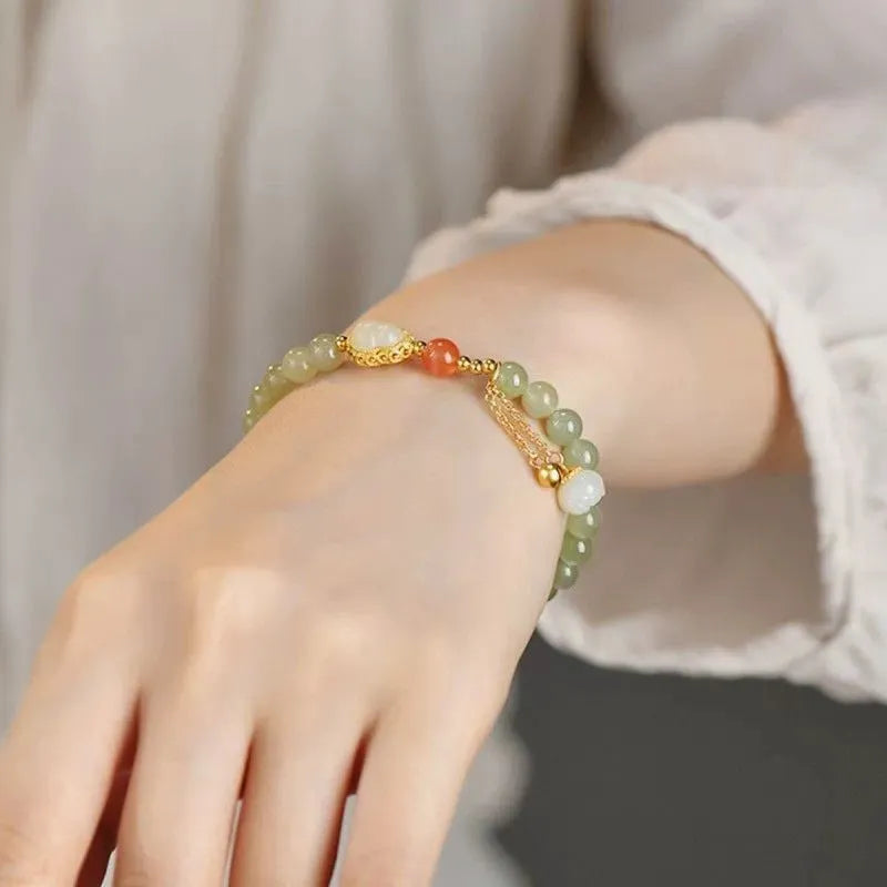 Qingshui jade women's bracelet with gold gourd charm and fu character, 6mm gold plated beads