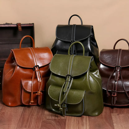 Korean style cowhide leather backpack in black with front sandwich pockets and internal organisation compartments
