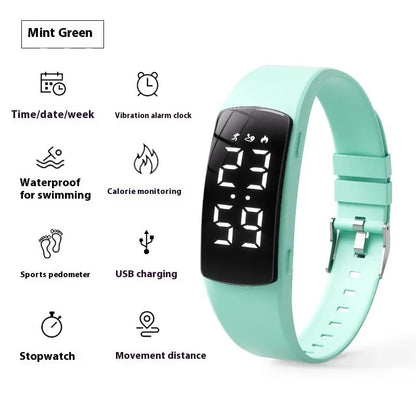 Smart electronic watch with vibration alarm on a silicone strap, showing LED display and 11mm thick case.