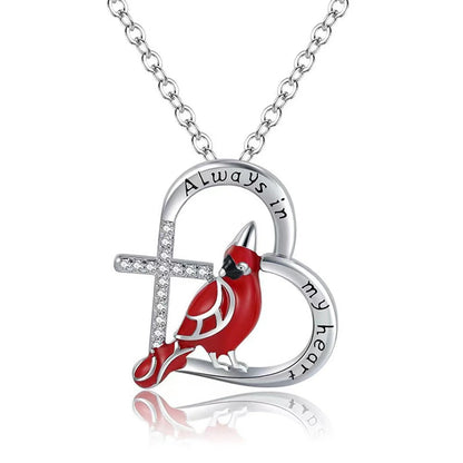 Elegant heart-shaped cardinal pendant necklace with a silver finish, perfect for gifting.