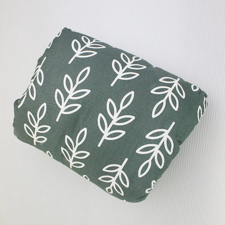 Adjustable nursing pillow with various color options, designed to provide comfort and support for breastfeeding mothers