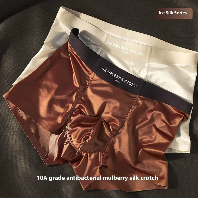 Men's solid colour satin ice silk boxer shorts laid flat, showing mid-waist design.