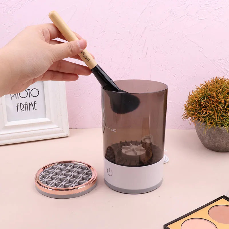 Grey and white portable electric makeup brush cleaner machine with USB charging cable