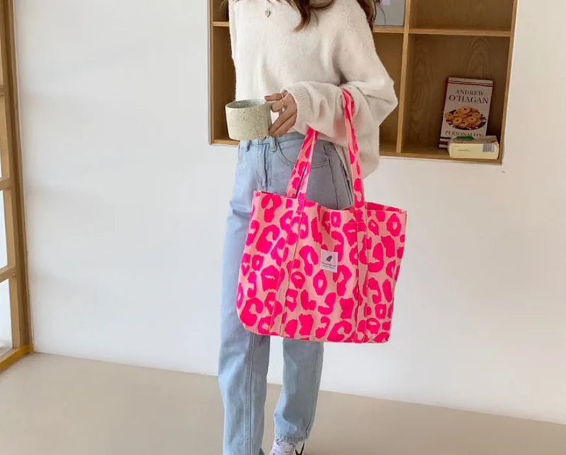 Large capacity canvas bag for women with simple design, three-dimensional pockets, made from Oxford cloth, available in pink, black, or sapphire blue, a versatile shoulder bag for everyday use