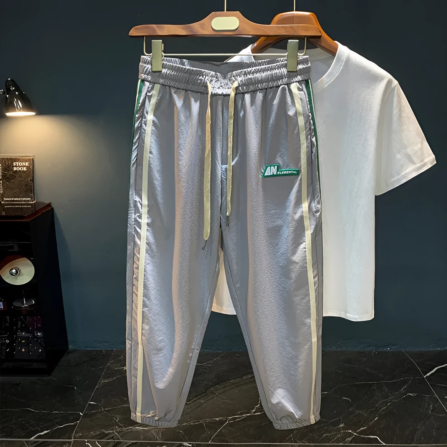 Men's grey cotton blend harem pants with elastic waistband and loose leg design