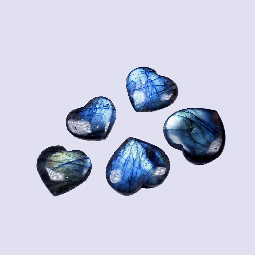 Natural pulled feldspar crystal heart pendant in ocean blue colour available in five sizes from 22mm to 45mm
